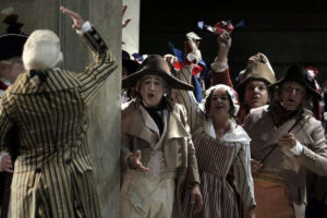 Robespierre waving to the crowd in Andrea Chénier (SF Opera)