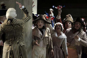 Robespierre waving to the crowd in Andrea Chénier (SF Opera)
